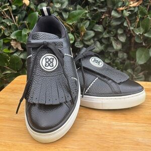 G/FORE Black and White Kiltie Sneakers with Fringe Women’s